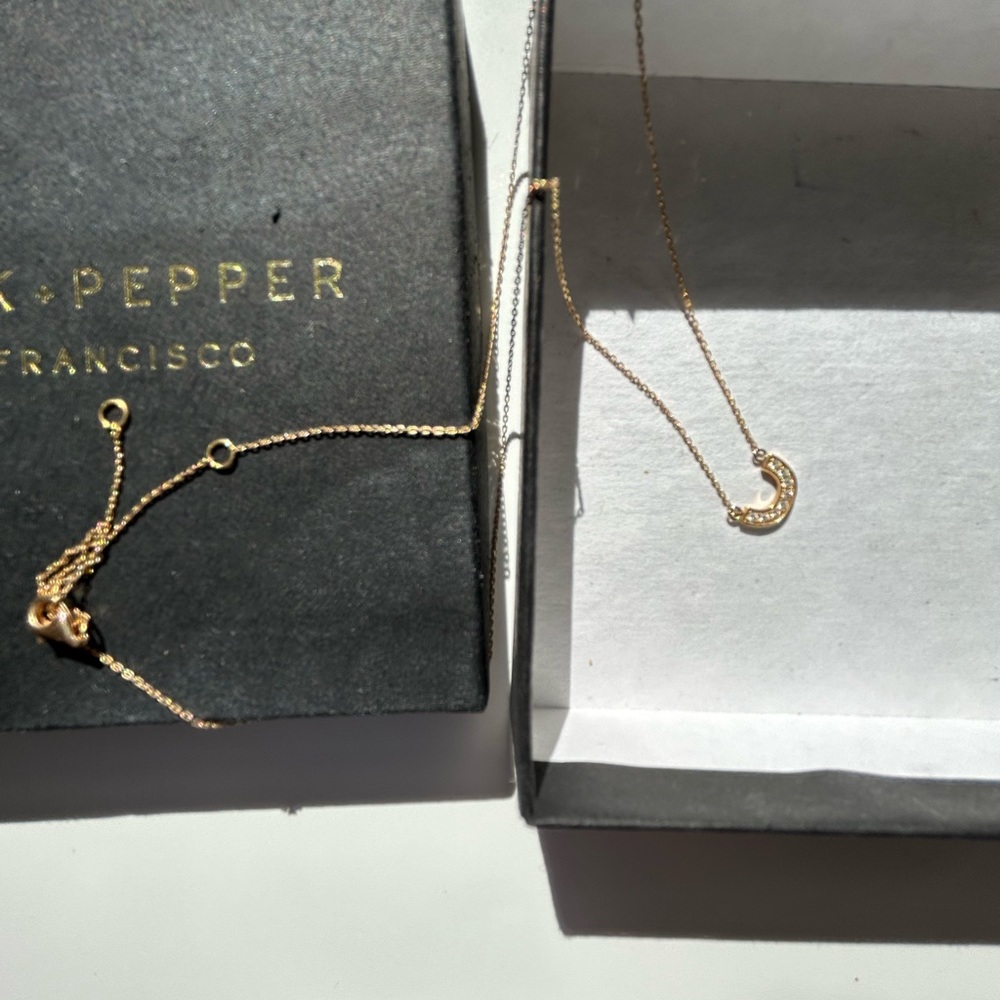 14k gold “spark and pepper@ brand 14k gold and pave diamond horseshoe necklace